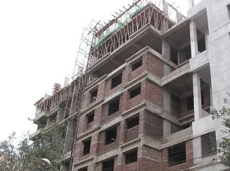Multi-storey building with scaffolding